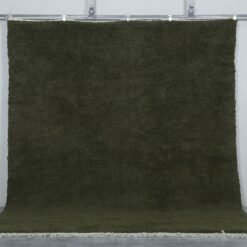 Moroccan Dark Green Wool Rug showing detailed hand-knotted texture, thick natural wool pile, and authentic Berber craftsmanship from the Atlas Mountains.