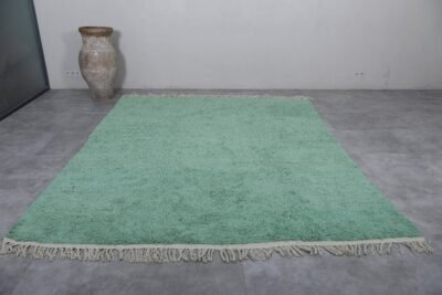Moroccan mint green wool rug, highlighting its even texture and handcrafted detail. Ideal for peaceful interior designs, from nurseries to modern lounges.