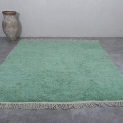 Moroccan mint green wool rug, highlighting its even texture and handcrafted detail. Ideal for peaceful interior designs, from nurseries to modern lounges.
