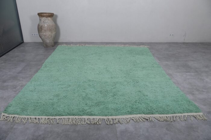 Moroccan mint green wool rug, highlighting its even texture and handcrafted detail. Ideal for peaceful interior designs, from nurseries to modern lounges.