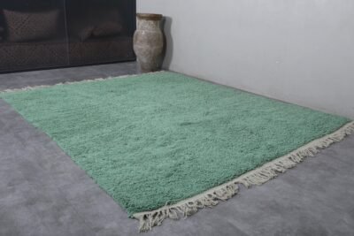 handcrafted Moroccan rug features 100% wool for a durable and luxurious addition to your space