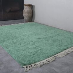 handcrafted Moroccan rug features 100% wool for a durable and luxurious addition to your space
