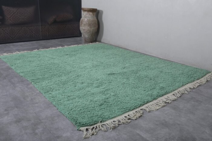 handcrafted Moroccan rug features 100% wool for a durable and luxurious addition to your space