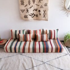 Artisan weaving colorful striped wool fabric for Moroccan cushions