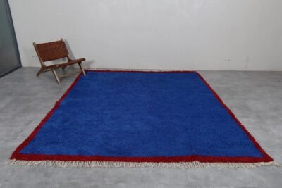 Moroccan Blue Beni Ourain rug, highlighting the intricate handwoven texture and rich blue hues. Crafted from soft, natural sheep wool by expert Moroccan artisans, this detailed shot showcases the high-quality fibers and artisan craftsmanship that give the rug its durable yet plush feel.