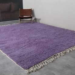 Moroccan Beni Ourain rug in stunning iris purple, highlighting the handcrafted texture and even wool pile. A perfect blend of Moroccan tradition and modern design.