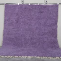 Luxurious iris purple Moroccan rug showing plush wool pile and Berber hand-knotting details. Custom-made for contemporary interiors with an artisanal touch.