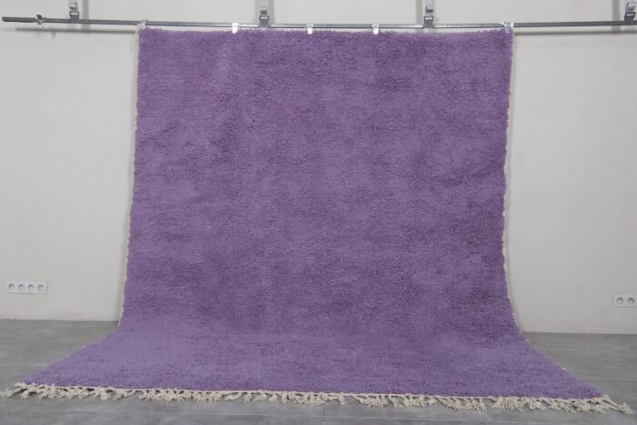 Luxurious iris purple Moroccan rug showing plush wool pile and Berber hand-knotting details. Custom-made for contemporary interiors with an artisanal touch.