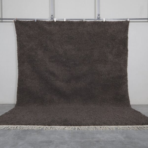 Authentic handmade dark gray Moroccan Berber rug crafted from 100% natural wool, showcasing traditional Beni Ourain weaving, ideal for modern, minimalist, and boho interiors.