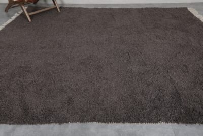 Moroccan dark gray wool rug, hand-knotted with care by skilled Berber women, customizable and timeless.