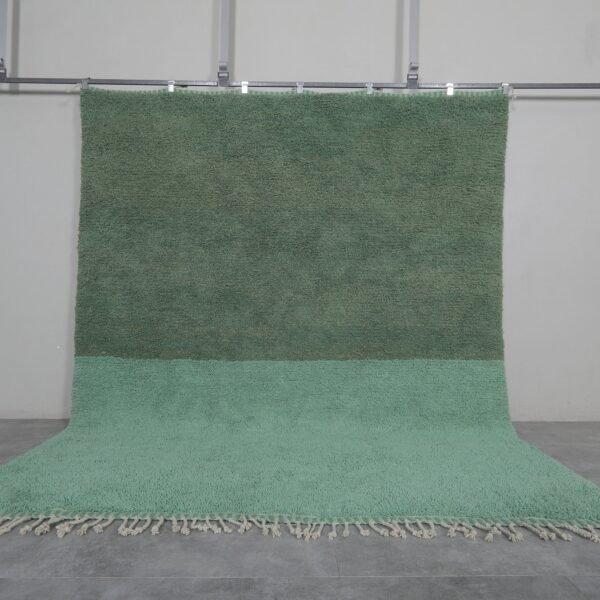 Handwoven Moroccan rug in green and pistachio colors, crafted from 100% genuine lamb wool with traditional Beni Ourain design.