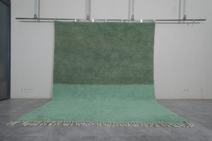 Handwoven Moroccan rug in green and pistachio colors, crafted from 100% genuine lamb wool with traditional Beni Ourain design.