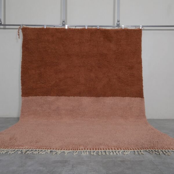 Handmade Moroccan Beni Ourain rug in warm rust and tan tones, crafted from 100% genuine lamb wool with soft and thick texture.