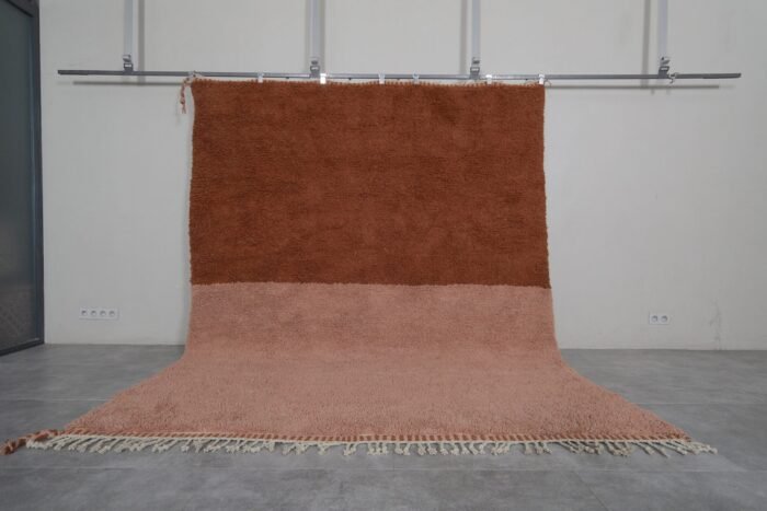 Handmade Moroccan Beni Ourain rug in warm rust and tan tones, crafted from 100% genuine lamb wool with soft and thick texture.