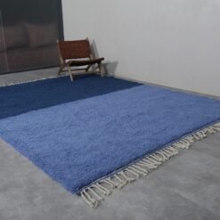 custom handmade Moroccan wool rug with bold cobalt blue and soft light blue patterning.