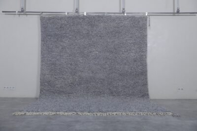 Authentic handmade Moroccan rug in charcoal gray, crafted with natural wool and traditional Berber weaving, perfect for neutral modern interiors.