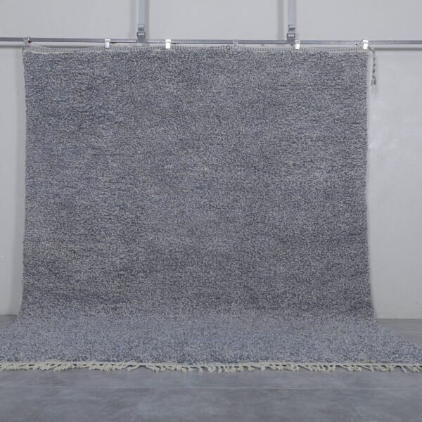 Authentic handmade Moroccan rug in charcoal gray, crafted with natural wool and traditional Berber weaving, perfect for neutral modern interiors.