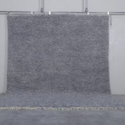 Authentic handmade Moroccan rug in charcoal gray, crafted with natural wool and traditional Berber weaving, perfect for neutral modern interiors.