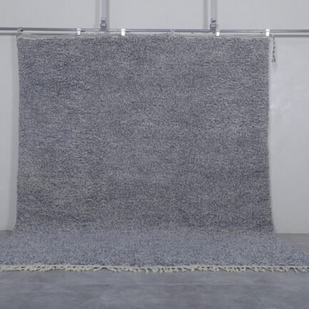 Authentic handmade Moroccan rug in charcoal gray, crafted with natural wool and traditional Berber weaving, perfect for neutral modern interiors.