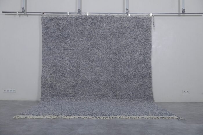 Authentic handmade Moroccan rug in charcoal gray, crafted with natural wool and traditional Berber weaving, perfect for neutral modern interiors.