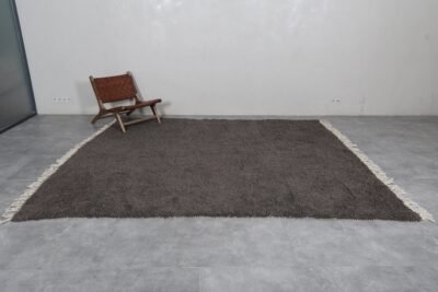 Dark gray Moroccan wool rug, handwoven in the Atlas Mountains with thick wool texture and artisanal Berber craftsmanship, perfect for cozy home decor.