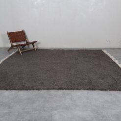 Dark gray Moroccan wool rug, handwoven in the Atlas Mountains with thick wool texture and artisanal Berber craftsmanship, perfect for cozy home decor.