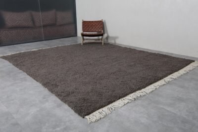 handmade Beni Ourain dark gray rug from Morocco, featuring deep neutral tones and soft, dense wool pile for stylish floor layering