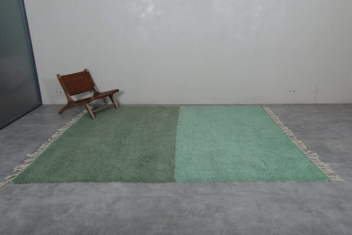 Moroccan green and pistachio wool rug, highlighting artisan craftsmanship.