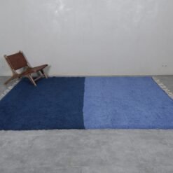 Moroccan Beni Ourain rug in cobalt and light blue, displaying its solid weave and artisan quality.