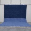 Handmade Moroccan Beni Ourain rug in a light and cobalt blue blend, crafted from 100% natural lamb wool by Berber artisans in the Atlas Mountains.