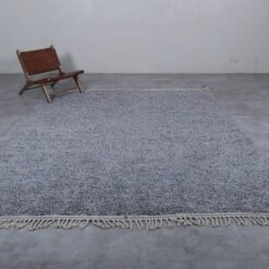 charcoal gray Beni Ourain rug, made from 100% wool, highlighting fine craftsmanship and timeless style.
