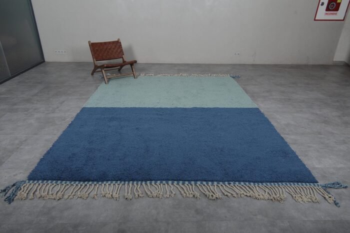 handmade Moroccan Berber rug in blue and pistachio, showing high-pile wool texture and detailed weaving.