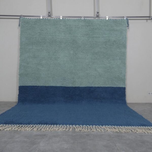 Handmade Moroccan Beni Ourain rug in blue and pistachio colors, crafted with 100% genuine lamb wool and woven by Berber artisans for a soft and modern finish.