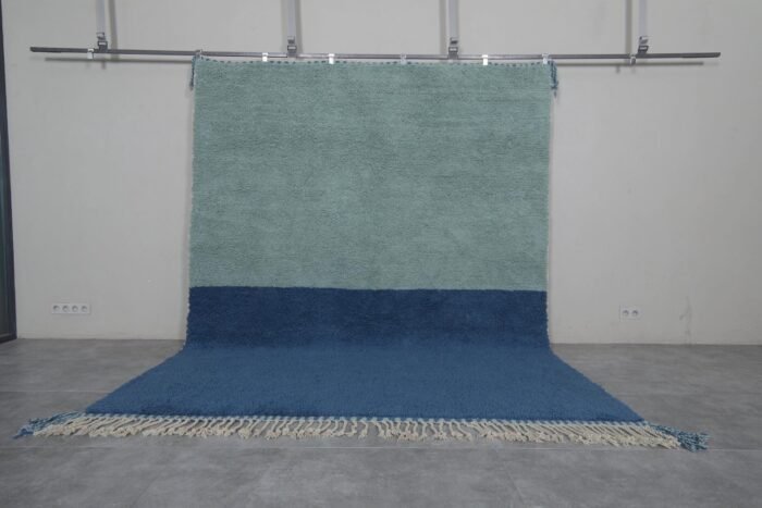 Handmade Moroccan Beni Ourain rug in blue and pistachio colors, crafted with 100% genuine lamb wool and woven by Berber artisans for a soft and modern finish.