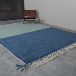 custom Moroccan wool rug featuring a calming blend of blue and pistachio tones in a traditional Beni Ourain design.