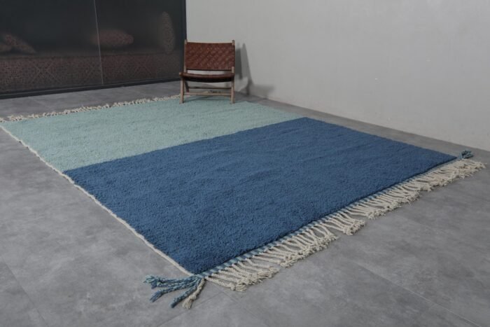 custom Moroccan wool rug featuring a calming blend of blue and pistachio tones in a traditional Beni Ourain design.