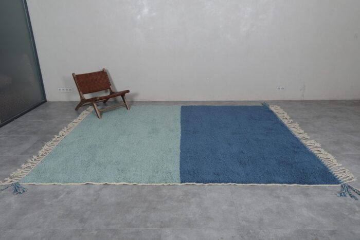 Beni Ourain rug in soft pistachio and blue, showcasing its plush surface and modern Moroccan aesthetic.