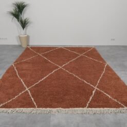 terracotta and ivory Beni Ourain Moroccan rug in custom size, highlighting the soft wool pile and detailed geometric design.