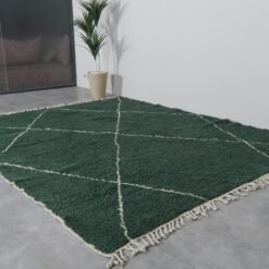 green Beni Ourain wool rug, highlighting traditional Moroccan hand-knotting and modern trellis design influence.