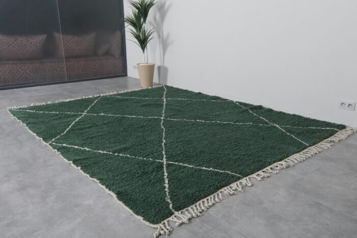 green Beni Ourain wool rug, highlighting traditional Moroccan hand-knotting and modern trellis design influence.