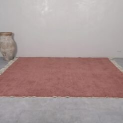 handmade Moroccan rust brown wool rug showcasing thick, soft fibers and traditional Berber craftsmanship, ideal for cozy living rooms or bedrooms with natural decor.