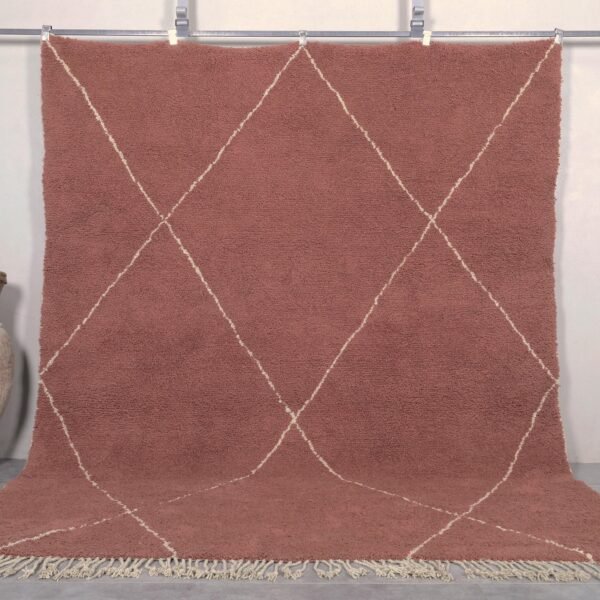 Handmade Moroccan rug featuring a rich chestnut brown base with an elegant ivory trellis pattern, crafted by Berber artisans using 100% genuine lamb wool in the traditional Beni Ourain style.