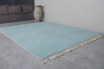 Turquoise Moroccan rug texture, showcasing thick handwoven wool fibers and soft pile perfect for living spaces.