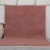 Handmade Moroccan rust brown Beni Ourain rug crafted with 100% natural lamb wool, featuring a rich, earthy solid color and a plush shag texture, perfect for adding warmth and elegance to modern or rustic interiors.
