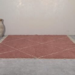chestnut Beni Ourain rug with ivory geometric pattern, showcasing natural lamb wool fibers and thick handmade texture.