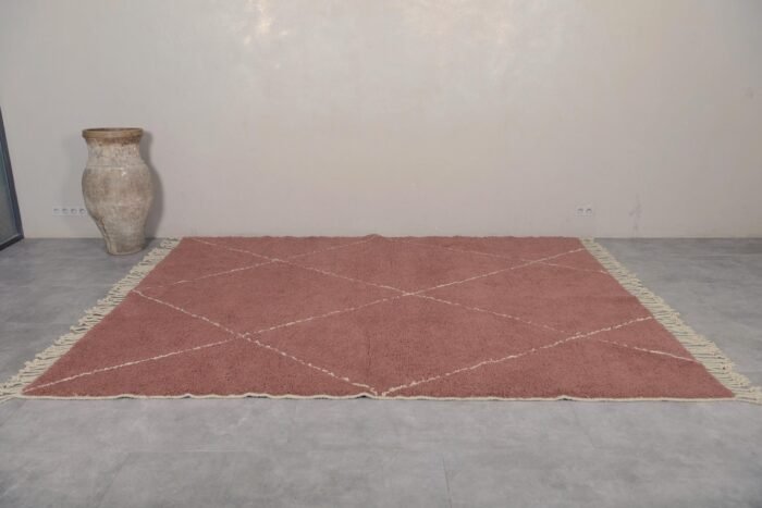 chestnut Beni Ourain rug with ivory geometric pattern, showcasing natural lamb wool fibers and thick handmade texture.