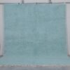 Handmade Moroccan Beni Ourain rug in vibrant turquoise, crafted from 100% natural wool by Berber artisans. A bold, luxurious wool area rug perfect for boho, coastal, or modern interiors.