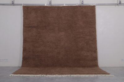 handmade brown Moroccan wool rug, showing clean edges, thick texture, and the richness of natural wool fibers.