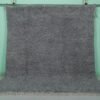 Handmade Moroccan gray wool rug with traditional Beni Ourain tribal patterns, crafted by skilled Berber artisans from 100% natural lamb wool, featuring a soft, durable pile perfect for living rooms and bedrooms with modern or rustic decor