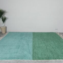 forest green and aqua Moroccan rug showing minimalist design and soft wool texture